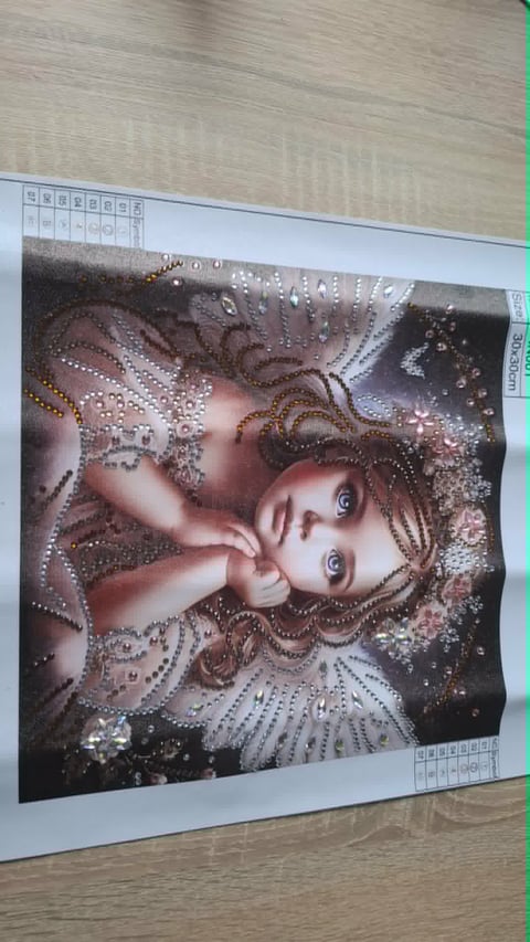 Fantasy portrait of a young woman with ornate beaded jewelry and decorative elements, printed on wood surface